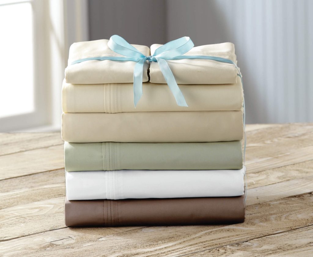 Clothes made up of cotton stacked up and tied with a ribbon
